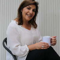 Ms Christine Savides